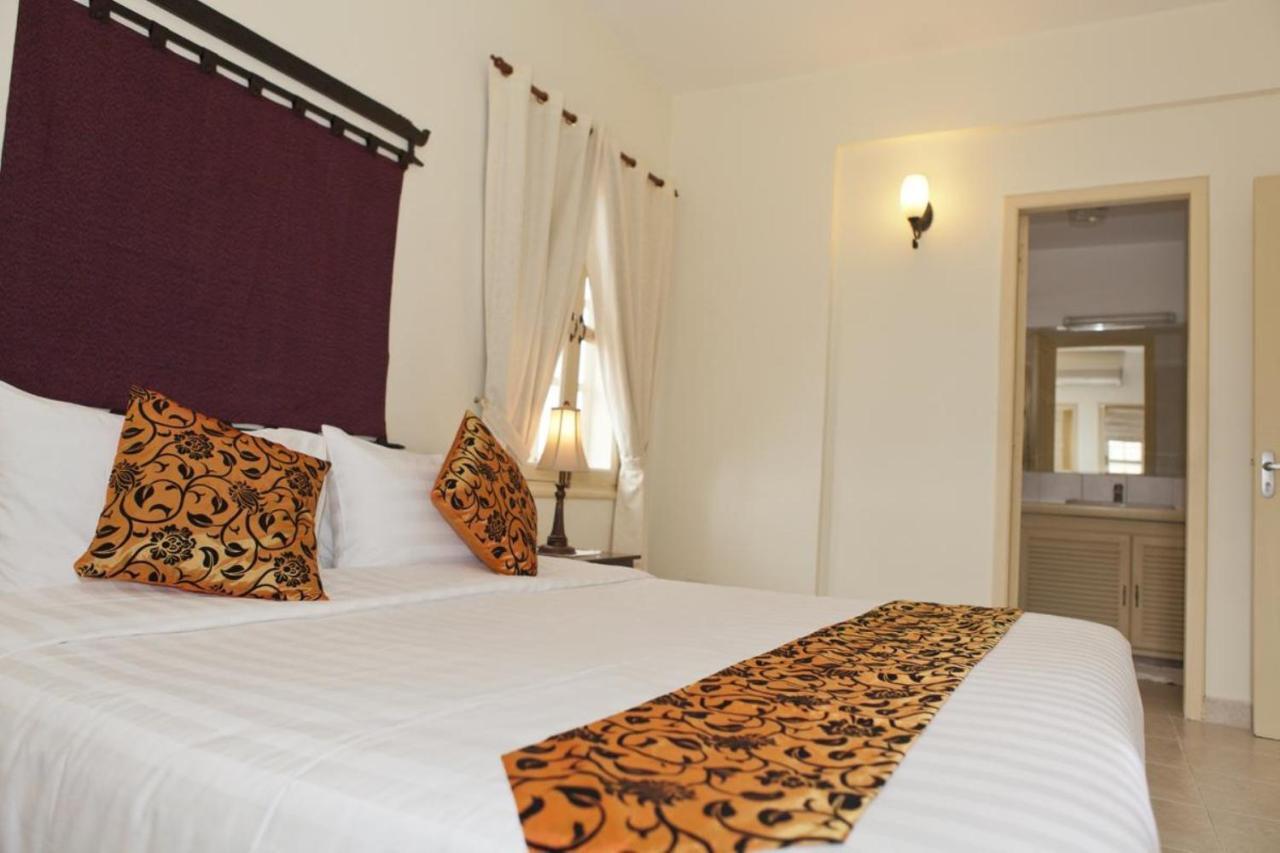 Grand Residence Phnom Penh Chambre photo